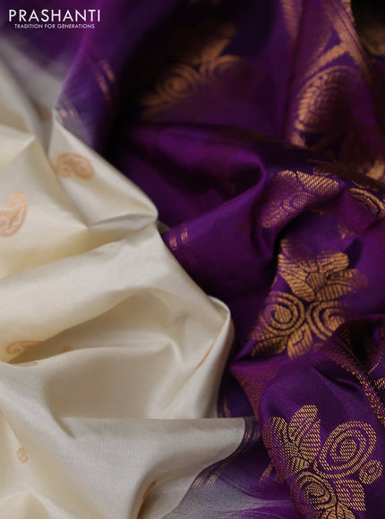 Pure gadwal silk saree off white and purple with allover zari woven buttas and temple design zari woven border