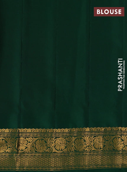 Pure gadwal silk saree orange and green with allover zari woven buttas and temple design zari woven border