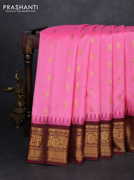 Pure gadwal silk saree pink and coffee brown with allover zari woven buttas and temple design zari woven border