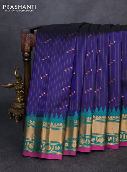 Pure gadwal silk saree violet and teal green with allover zari woven buttas and temple design zari woven border