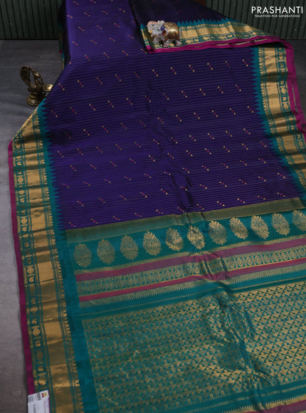 Pure gadwal silk saree violet and teal green with allover zari woven buttas and temple design zari woven border