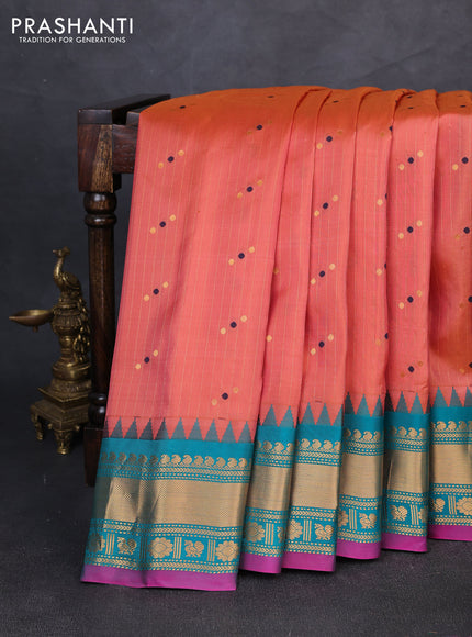 Pure gadwal silk saree dual shade of peach and teal green with allover zari weaves & woven buttas and temple design zari woven border