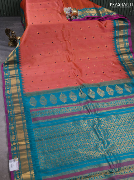 Pure gadwal silk saree dual shade of peach and teal green with allover zari weaves & woven buttas and temple design zari woven border