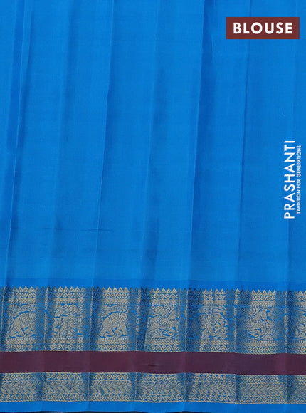 Pure gadwal silk saree yellow and cs blue with allover zari woven buttas and temple design zari woven border