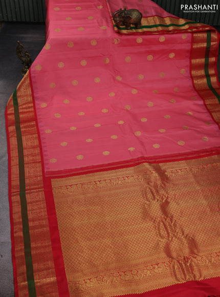 Pure gadwal silk saree peach pink and red with allover zari woven buttas and temple design zari woven border