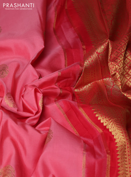 Pure gadwal silk saree peach pink and red with allover zari woven buttas and temple design zari woven border