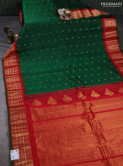 Pure gadwal silk saree green and red with allover zari woven buttas and temple design zari woven border