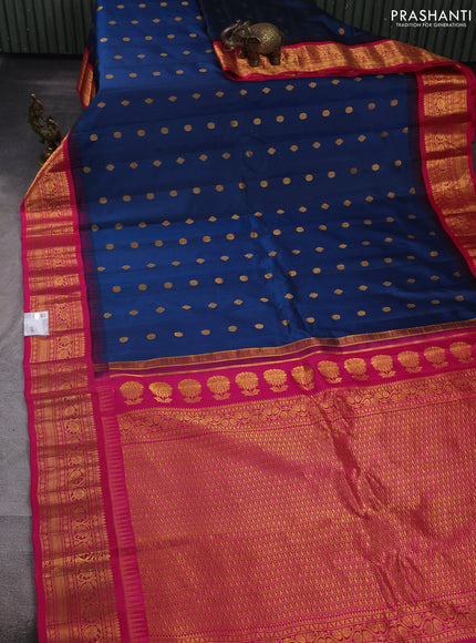 Pure gadwal silk saree peacock blue and pink with allover zari woven buttas and temple design zari woven border