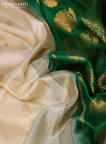 Pure gadwal silk saree off white and green with allover zari woven buttas and temple design zari woven border