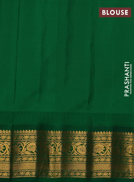 Pure gadwal silk saree off white and green with allover zari woven buttas and temple design zari woven border
