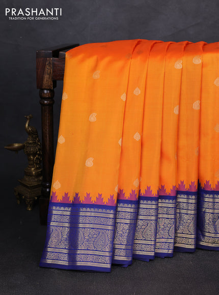 Pure gadwal silk saree orange and blue with allover zari woven buttas and temple design zari woven border