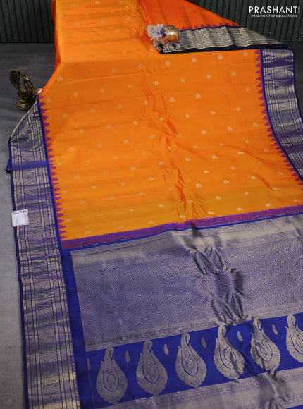Pure gadwal silk saree orange and blue with allover zari woven buttas and temple design zari woven border