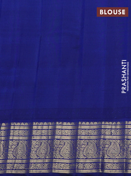 Pure gadwal silk saree orange and blue with allover zari woven buttas and temple design zari woven border