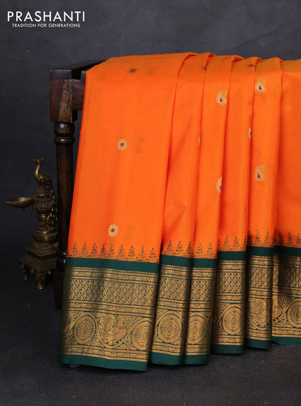 Pure gadwal silk saree orange and bottle green with allover thread & zari woven buttas and temple design zari woven border