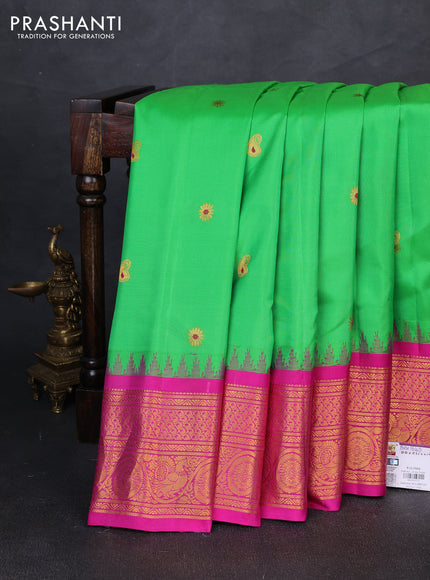 Pure gadwal silk saree light green and pink with allover thread & zari woven buttas and temple design zari woven border