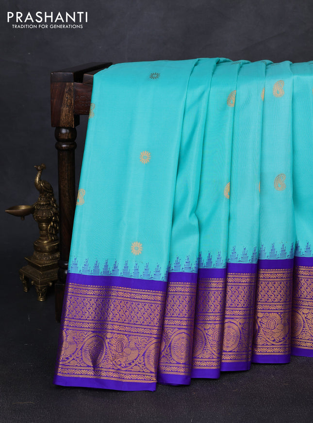 Pure gadwal silk saree teal blue and royal blue with allover zari woven buttas and temple design zari woven border