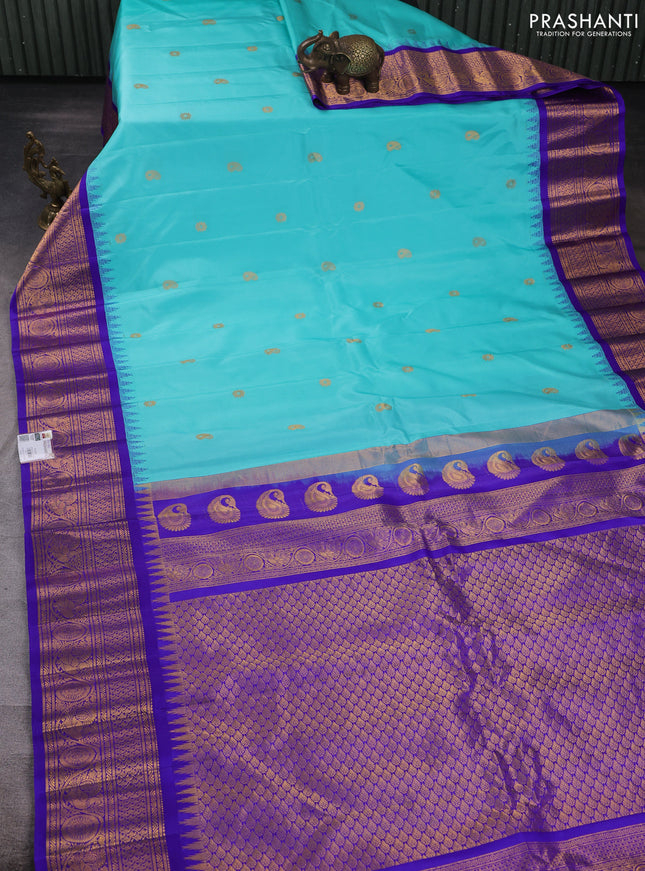 Pure gadwal silk saree teal blue and royal blue with allover zari woven buttas and temple design zari woven border