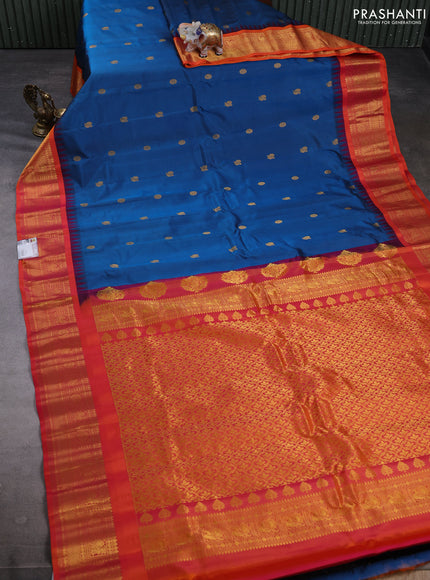 Pure gadwal silk saree peacock blue and orange with allover zari woven buttas and temple design zari woven border