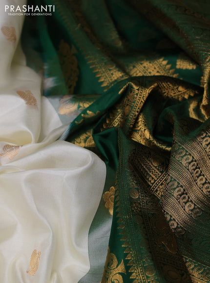 Pure gadwal silk saree off white and bottle green with allover zari woven buttas and temple design zari woven border