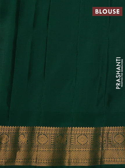 Pure gadwal silk saree off white and bottle green with allover zari woven buttas and temple design zari woven border