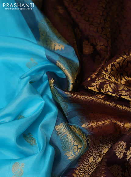 Pure gadwal silk saree teal blue and coffee brown with allover zari woven buttas and temple design zari woven border