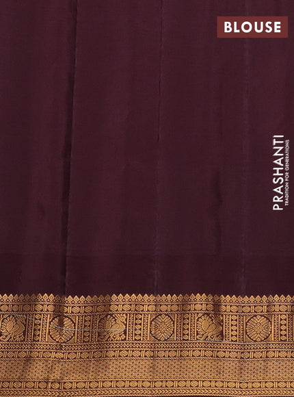 Pure gadwal silk saree teal blue and coffee brown with allover zari woven buttas and temple design zari woven border