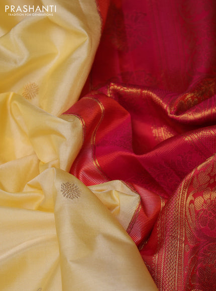 Pure gadwal silk saree pale yellow and pink with allover zari woven buttas and rettapet zari woven korvai border