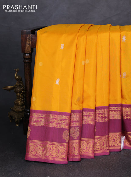 Pure gadwal silk saree mustard yellow and magentaa pink with allover silver & zari woven buttas and zari woven korvai border