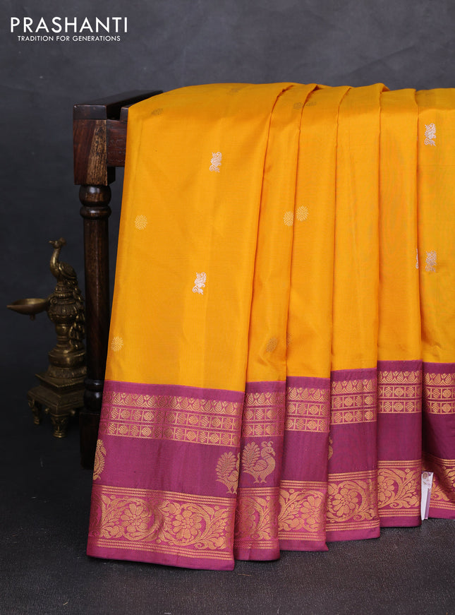 Pure gadwal silk saree mustard yellow and magentaa pink with allover silver & zari woven buttas and zari woven korvai border