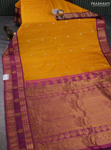 Pure gadwal silk saree mustard yellow and magentaa pink with allover silver & zari woven buttas and zari woven korvai border