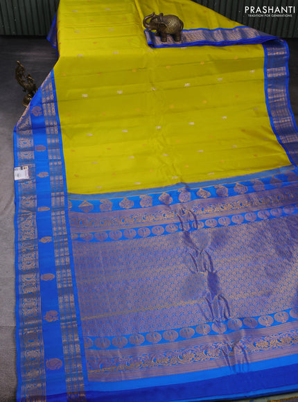 Pure gadwal silk saree lime green and cs blue with allover zari woven buttas and zari woven korvai border