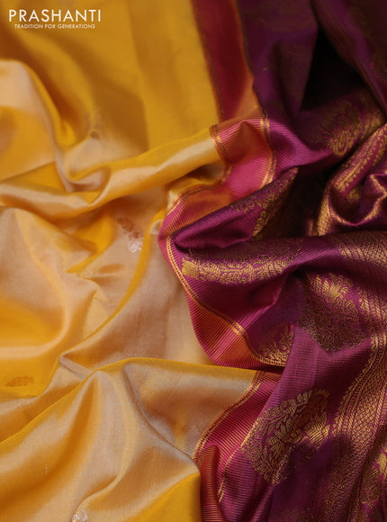 Pure gadwal silk saree pale yellow and magenta pink with allover zari woven buttas and rettapet zari woven korvai border