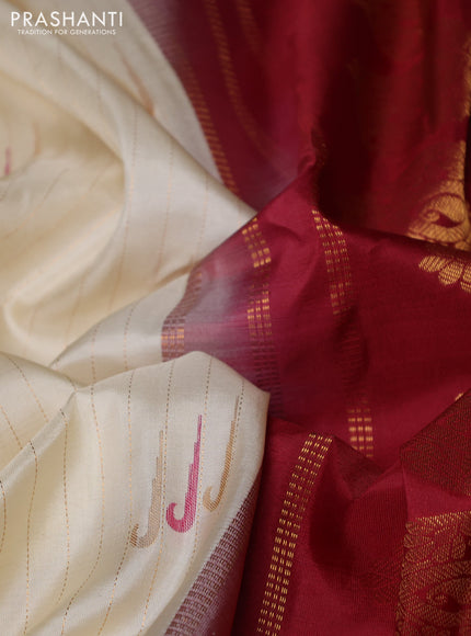 Pure gadwal silk saree cream and maroon with allover zari weaves & muniya buttas and temple design zari woven border