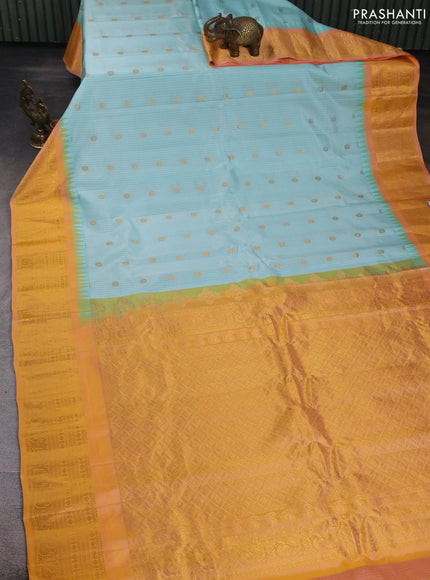Pure gadwal silk saree pastel blue and peach orange with allover checks & buttas and temple design zari woven border
