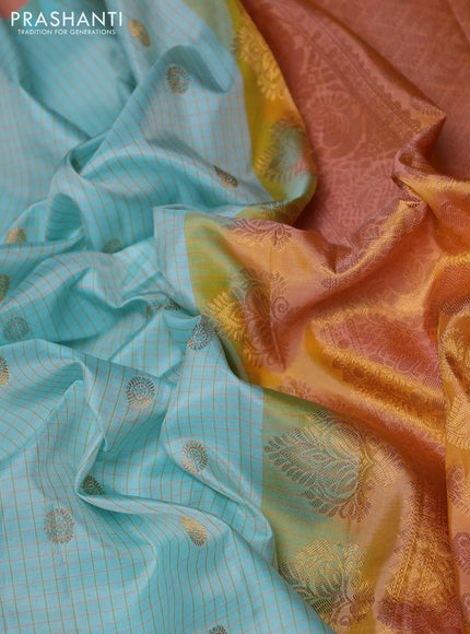 Pure gadwal silk saree pastel blue and peach orange with allover checks & buttas and temple design zari woven border