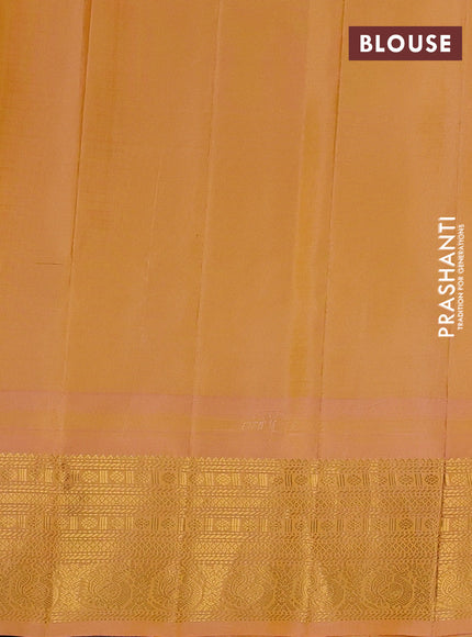 Pure gadwal silk saree pastel blue and peach orange with allover checks & buttas and temple design zari woven border