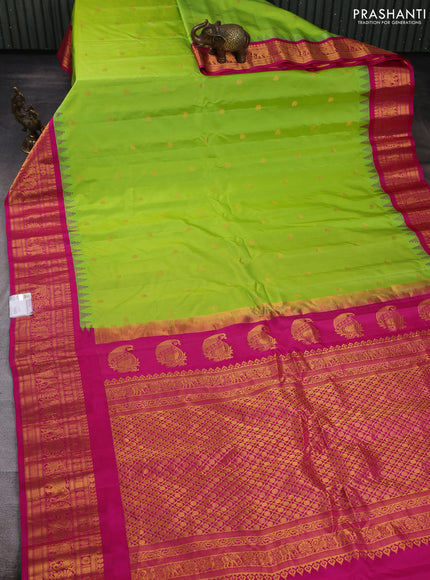 Pure gadwal silk saree light green and pink with allover zari woven buttas and temple design zari woven border