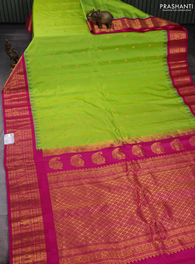 Pure gadwal silk saree light green and pink with allover zari woven buttas and temple design zari woven border