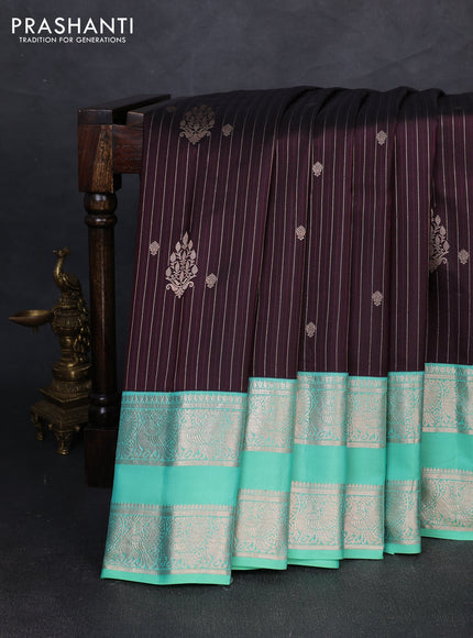 Pure gadwal silk saree coffee brown and teal green with allover copper zari weaves & buttas and rettapet zari woven border