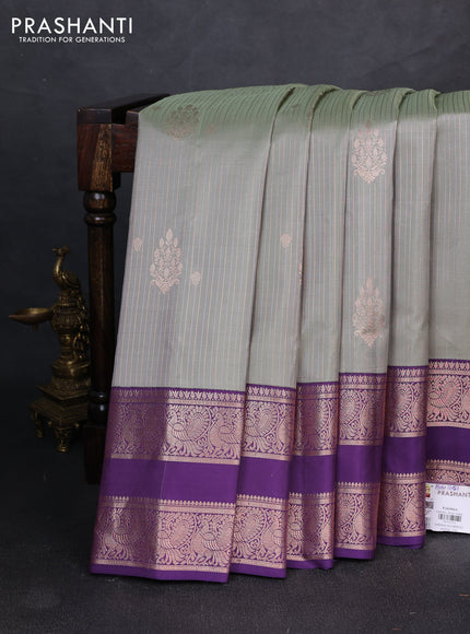 Pure gadwal silk saree grey and purple with allover zari woven buttas and temple design zari woven border