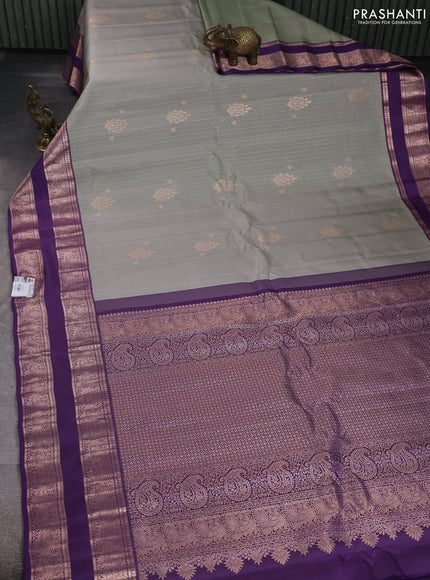 Pure gadwal silk saree grey and purple with allover zari woven buttas and temple design zari woven border