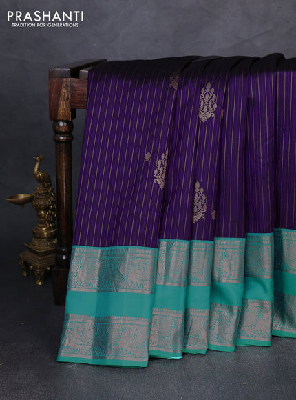 Pure gadwal silk saree violet and teal blue with allover copper zari weaves & buttas and rettapet zari woven border