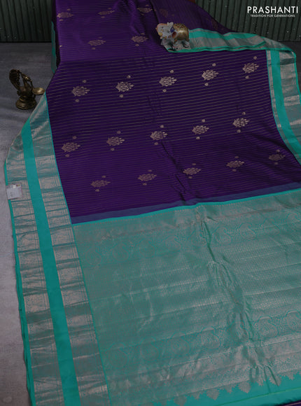 Pure gadwal silk saree violet and teal blue with allover copper zari weaves & buttas and rettapet zari woven border