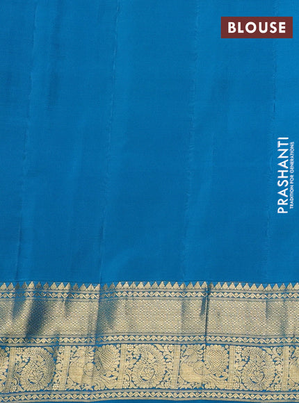 Pure gadwal silk saree light pink and cs blue with allover zari woven buttas and temple design zari woven border