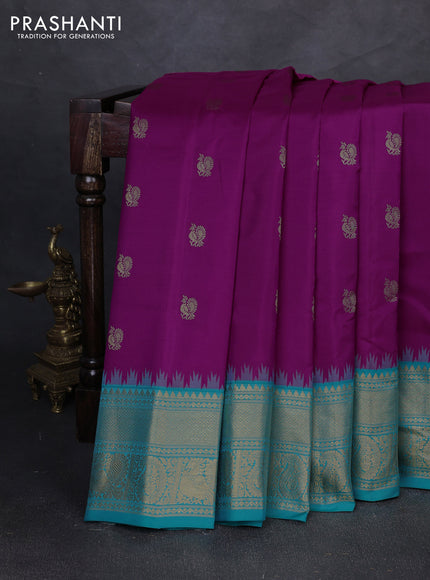 Pure gadwal silk saree magenta pink and teal blue with allover zari woven buttas and temple design zari woven border