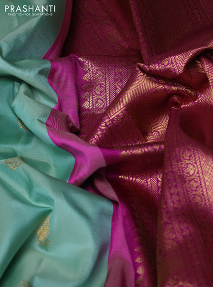 Pure gadwal silk saree mild teal and magenta pink with allover zari woven buttas and temple design zari woven border