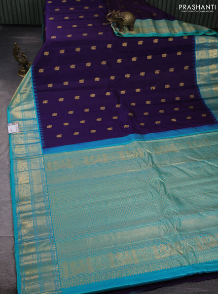 Pure gadwal silk saree violet and teal green with allover annam zari woven buttas and temple design zari woven border