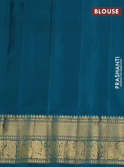 Pure gadwal silk saree sandal and peacock blue with allover zari woven buttas and temple design zari woven border