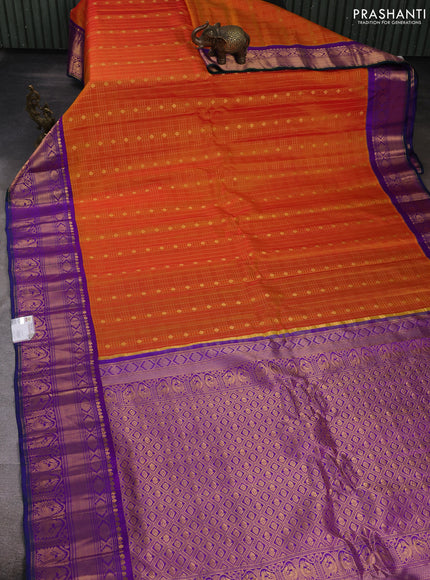 Pure gadwal silk saree sunset orange and violet with allover zari woven buttas and zari woven korvai border