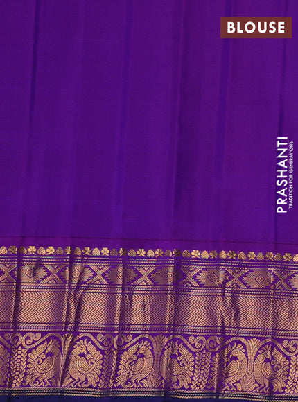 Pure gadwal silk saree sunset orange and violet with allover zari woven buttas and zari woven korvai border